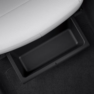 Top view of the Spigen Model Y Juniper underseat organizer installed in the cabin