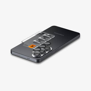 Spigen Galaxy S26 Optik EZ Fit Lens Pro Protector showing the lens protector tray hovering above the lens protector and the device