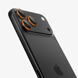 Spigen iPhone 17 Pro Max / 17 Pro Lens Protector – Optik Pro EZ Fit - Orange - angled view of orange protectors
