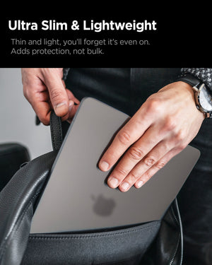 Spigen MacBook Pro 14-inch Air Skin in Frost Black showing ultra slim and lightweight.