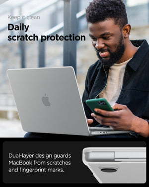 Spigen MacBook Pro 14-inch Air Skin in Frost Clear showing keep it clean, daily scratch protection