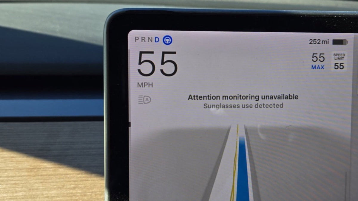 Tesla cabin camera driver monitoring with sunglasses during FSD Supervised use