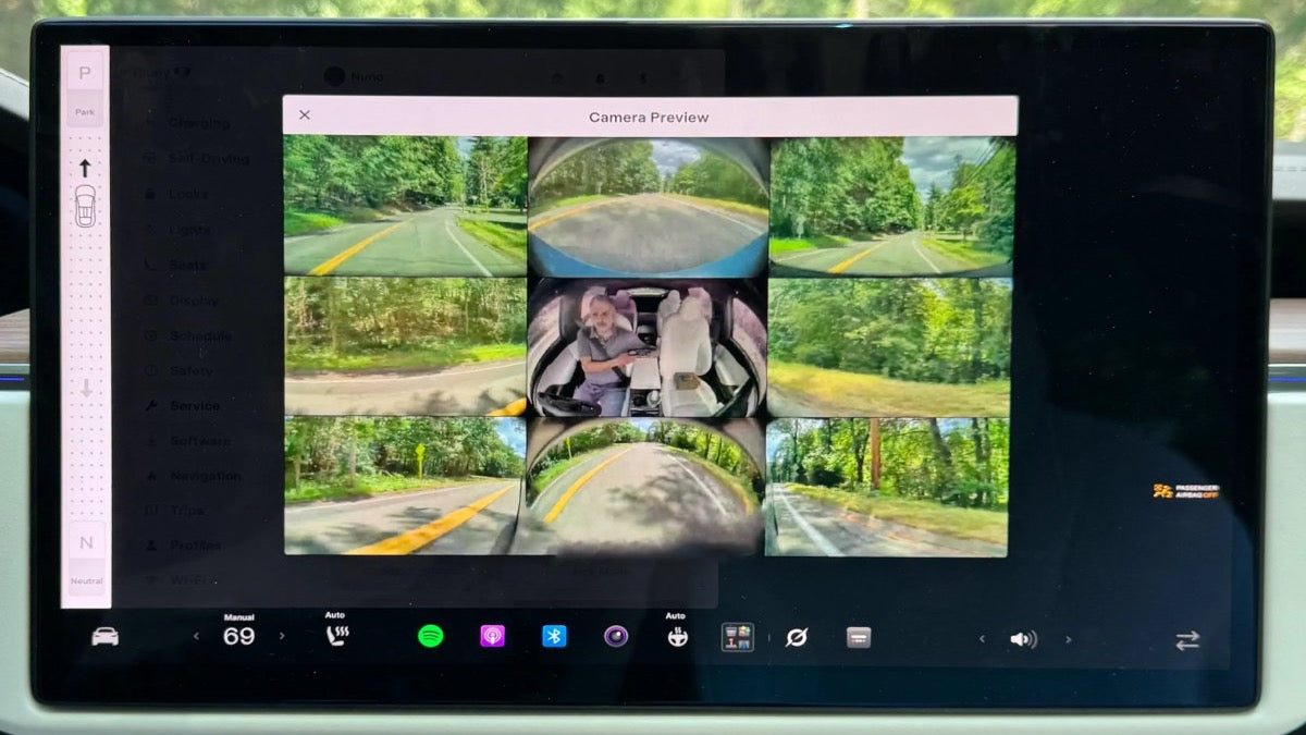 Tesla camera previews while driving owner guide for screen visibility and camera checks