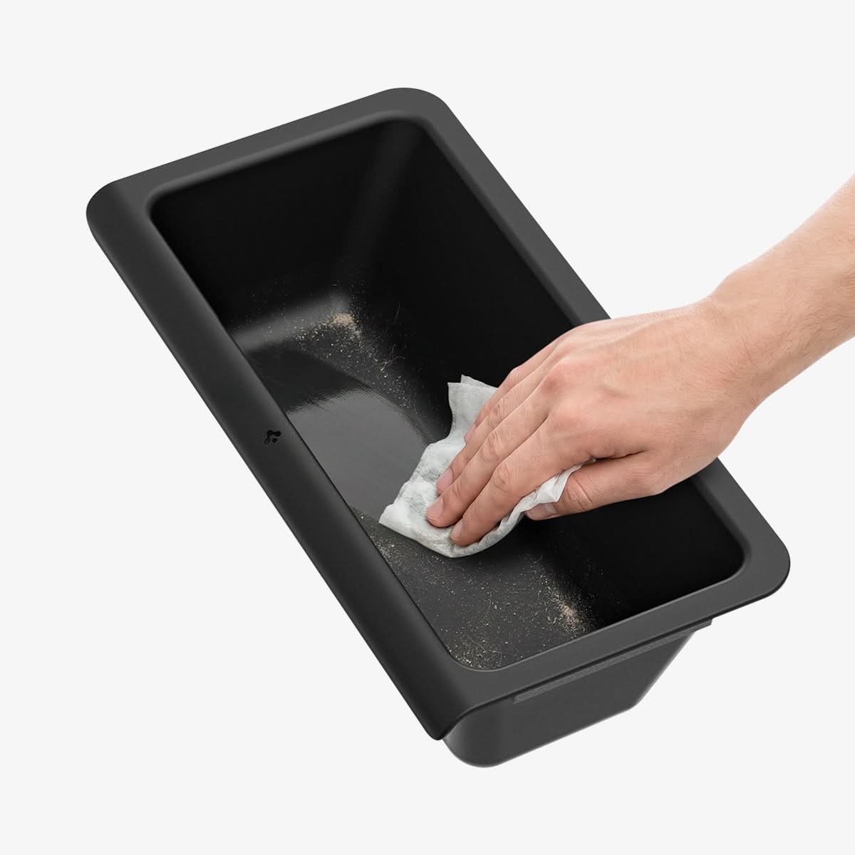 Spigen TO222J underseat organizer being wiped clean by hand