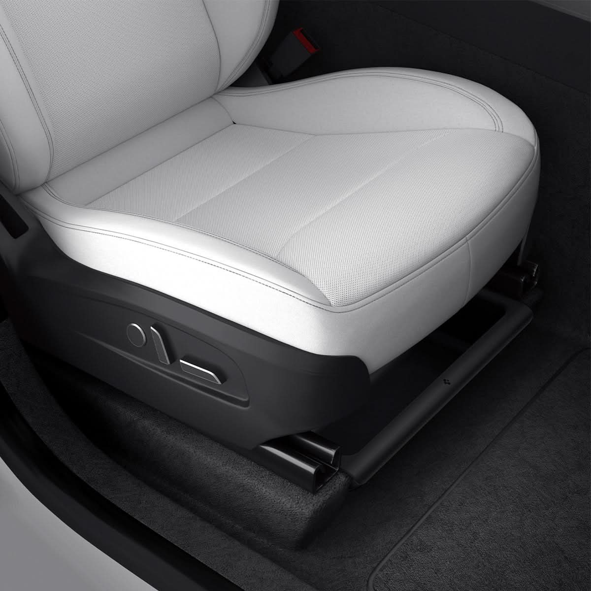 Spigen TO222J black underseat organizer installed beneath a white front seat