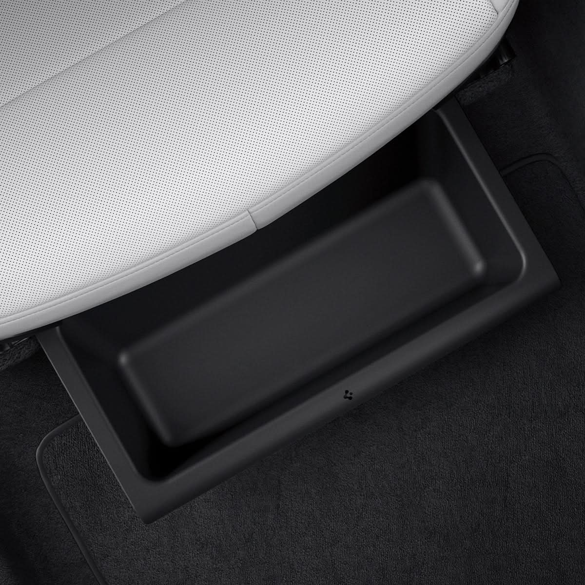 Top view of the Spigen Model Y Juniper underseat organizer installed in the cabin