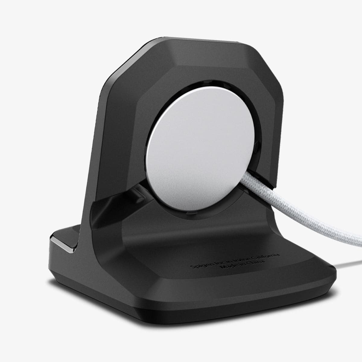 Rear view showing the Apple Watch charging puck and cable routing