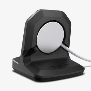 Rear view showing the Apple Watch charging puck and cable routing