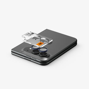 iPhone Duo Optik Pro EZ Fit Lens Protector in Black showing the EZ Fit Optik Pro tray aligned above the camera lenses for easy installation