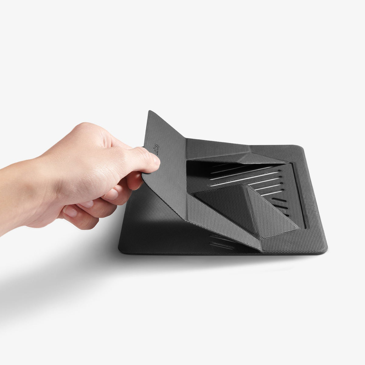 AMP11115 - Slim Fold Laptop Stand | Non-Adhesive LD201-S6 showing slim fold laptop stand from the side propped up at low angle