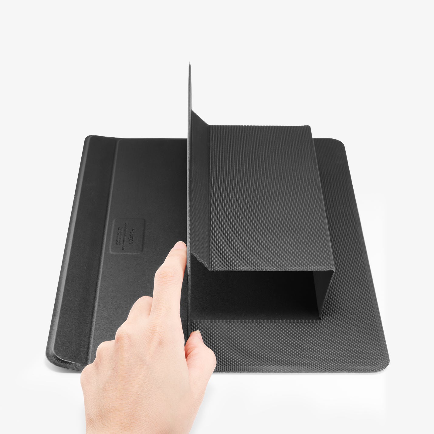 AMP11116 - Slim Fold Laptop Stand | LD201-S7 showing a hand showing how to prop up the slim fold laptop stand