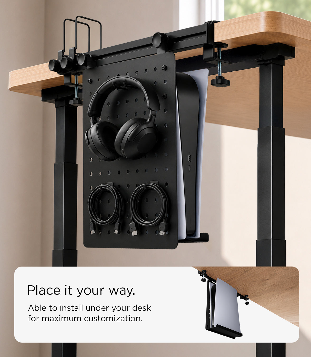 Under-desk LD406 installation holding headphones and coiled cables