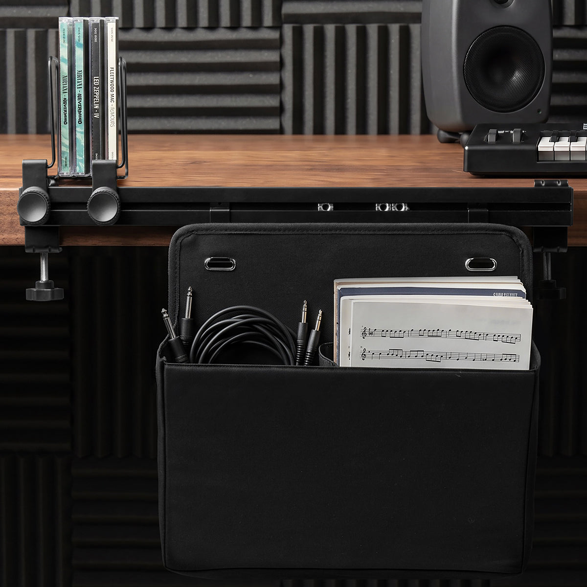 LD406 side organizer pouch holding cables and documents below a desk rail