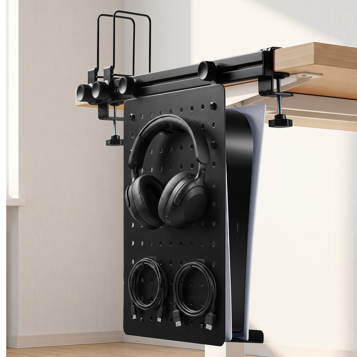 Vertical under-desk LD406 pegboard holding headphones and cables