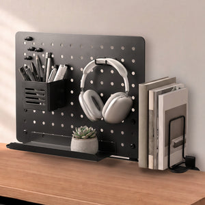 LD406 pegboard arranging headphones, stationery, books and a small plant