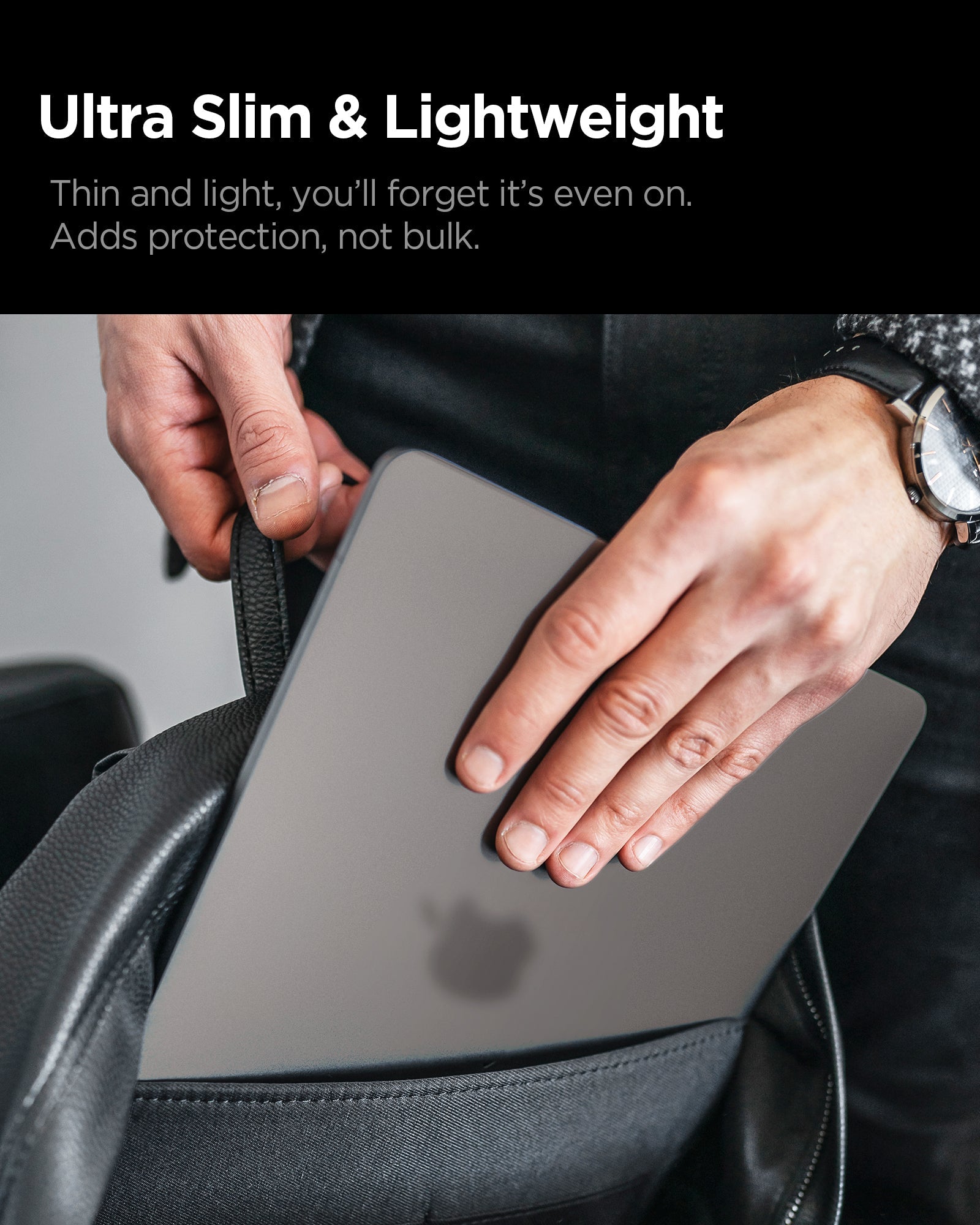 Spigen MacBook Pro 14-inch Air Skin in Frost Black showing ultra slim and lightweight.