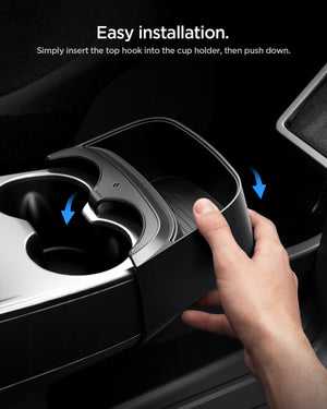 Installing Spigen Console Storage Extender around Tesla cup holder