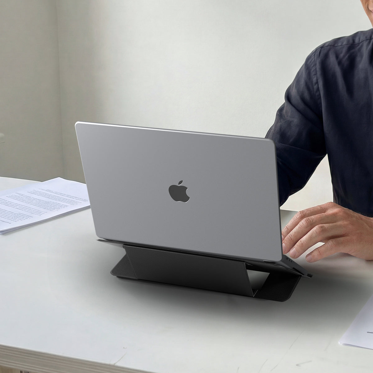 AMP11116 - Slim Fold Laptop Stand | LD201-S7 showing back view of person using iPad propped up on laptop stand