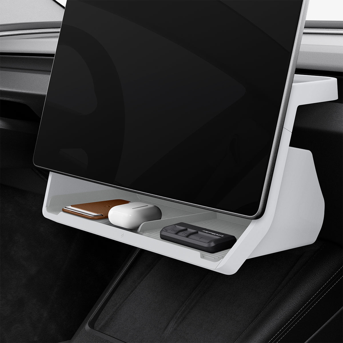 Spigen TO227H White under-screen organizer installed in a compatible Tesla cabin